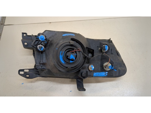 Фара передняя Mitsubishi Pajero / Montero 2000-2006 левая