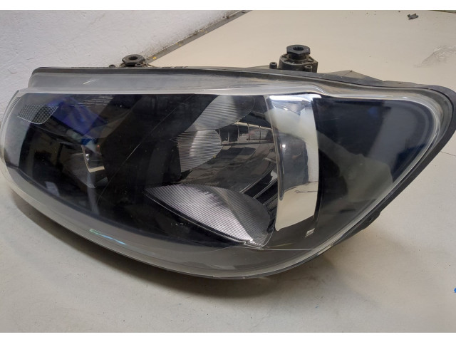 Фара передняя Volkswagen Caddy 2004-2015 левая