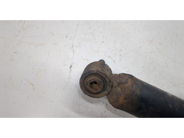 Стойка амортизатора Nissan Pathfinder 2004-2014 2.5 дизель