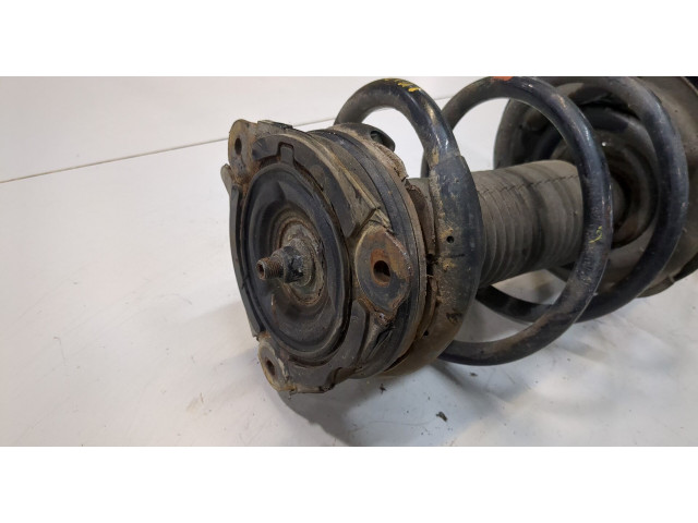 Стойка амортизатора Nissan Pathfinder 2012-2017