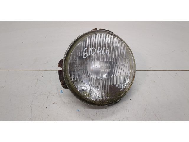 Фара передняя Mitsubishi Pajero 1982-1991 левая