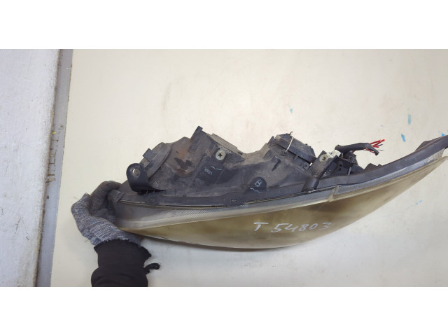 Фара передняя  Toyota Corolla E12 2001-2006 левая 