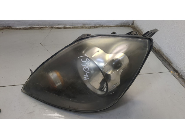 Фара передняя  Ford Fiesta 2001-2007 левая 