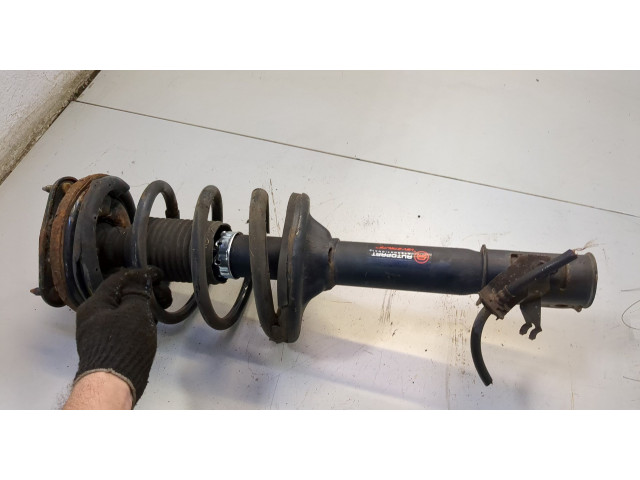 Стойка амортизатора  Mitsubishi Outlander 2003-2009 MN133394, MN101529     