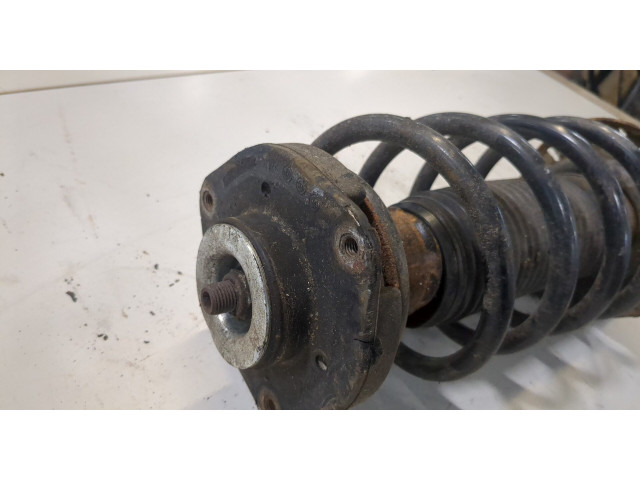 Стойка амортизатора Skoda SuperB 2008-2015