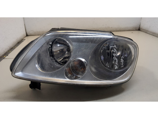 Фара передняя Volkswagen Caddy 2004-2015 левая