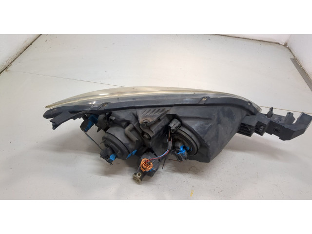 Фара передняя Mazda 3 (BK) 2003-2009 левая