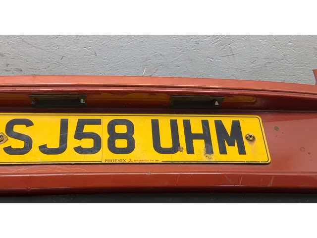 Бампер Mitsubishi Colt 2004-2008 задний