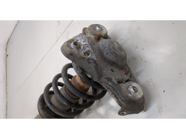 Стойка амортизатора  Skoda SuperB 2001-2008      