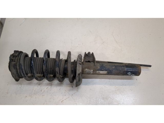 Стойка амортизатора Volkswagen Caddy 2004-2010