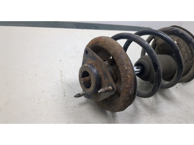 Стойка амортизатора Mitsubishi Outlander XL 2006-2012