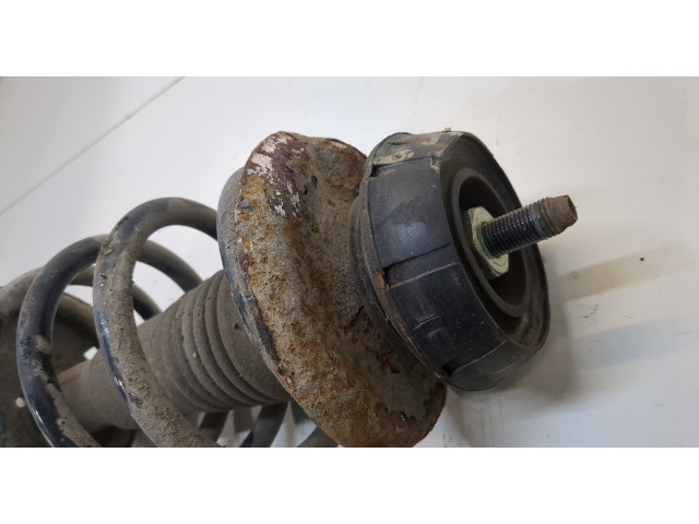 Стойка амортизатора Dacia Logan 2004-2012