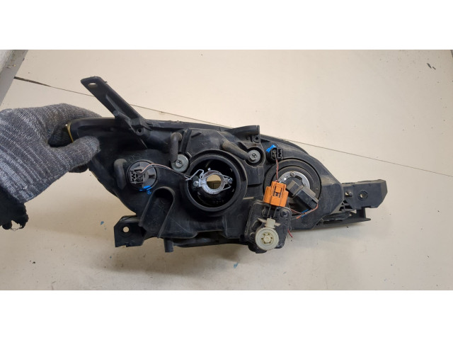 Фара передняя Mazda 3 (BK) 2003-2009 левая