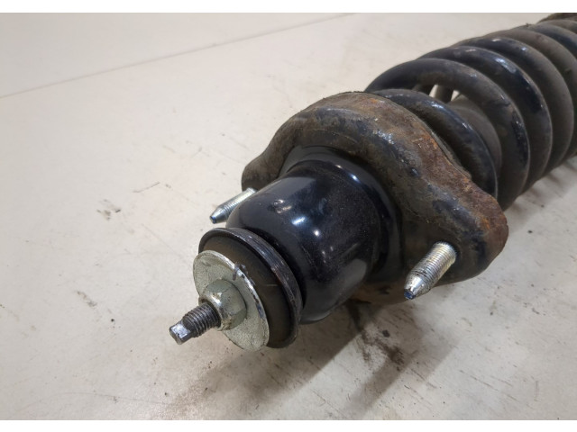 Стойка амортизатора Mitsubishi Outlander 2012-2021