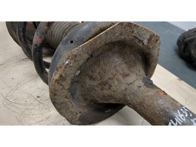 Стойка амортизатора Mitsubishi Outlander XL 2006-2012