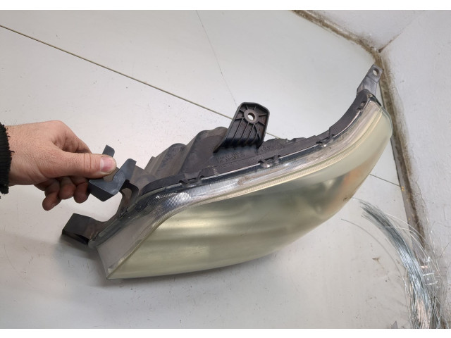 Фара передняя  Honda Pilot 2002-2008 левая 