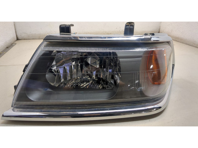 Фара передняя Mitsubishi Montero Sport / Pajero Sport 1996-2008 левая