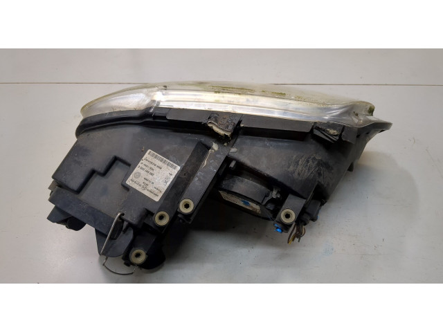 Фара передняя  Volkswagen Caddy 2004-2010 левая 