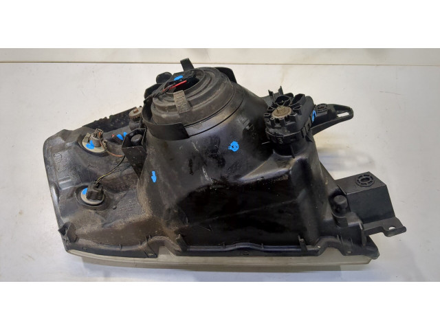 Фара передняя Mitsubishi Pajero / Montero 2000-2006 левая