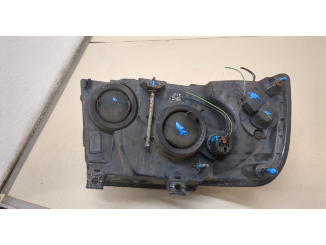 Фара передняя Ford Expedition 2002-2006 левая