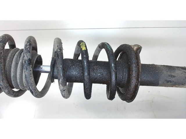 Стойка амортизатора Mitsubishi Colt 1996-2004 MR244447, MB871085 1.3 бензин