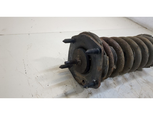 Стойка амортизатора  Jeep Commander 2006-2010      