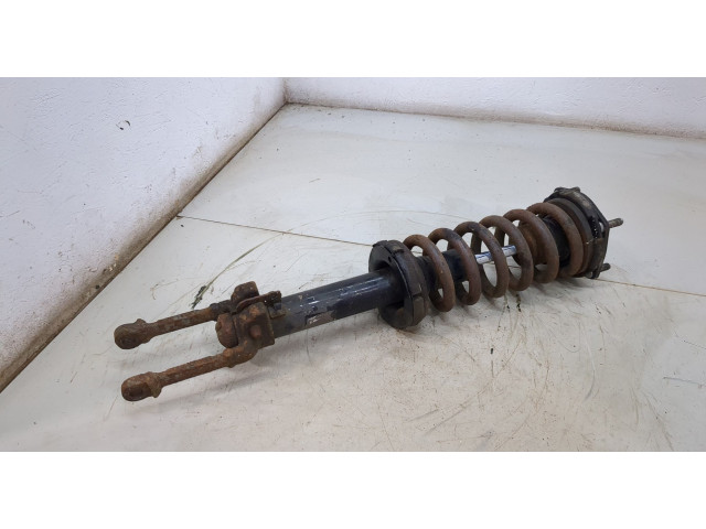 Стойка амортизатора Jeep Commander 2006-2010