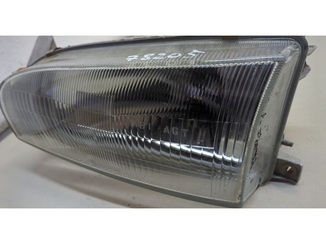 Фара передняя Toyota Corolla 1992-1997 левая