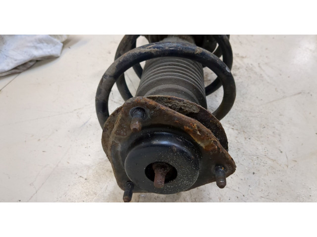 Стойка амортизатора Jeep Patriot 2010-