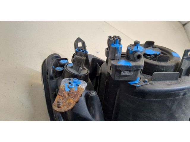 Фара передняя Mitsubishi L200 2006-2015 левая