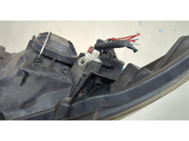 Фара передняя  Toyota Corolla E12 2001-2006 левая 