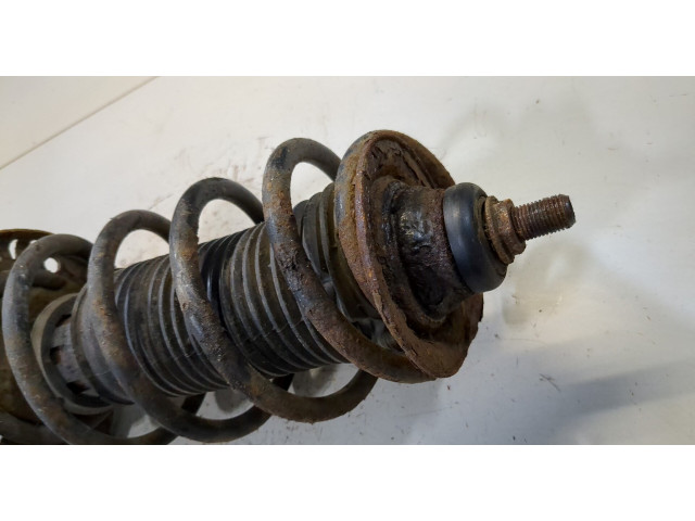 Стойка амортизатора  Skoda Fabia 2007-2010      