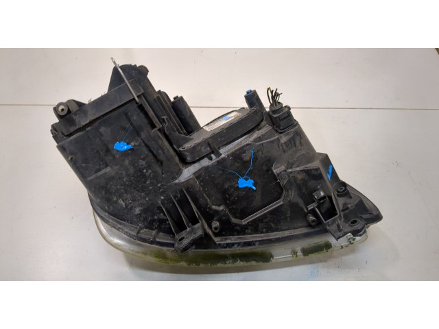 Фара передняя  Volkswagen Caddy 2004-2010 левая 