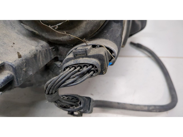 Фара передняя Volkswagen Transporter 5 2003-2009 левая