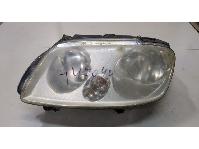 Фара передняя  Volkswagen Caddy 2004-2010 левая 