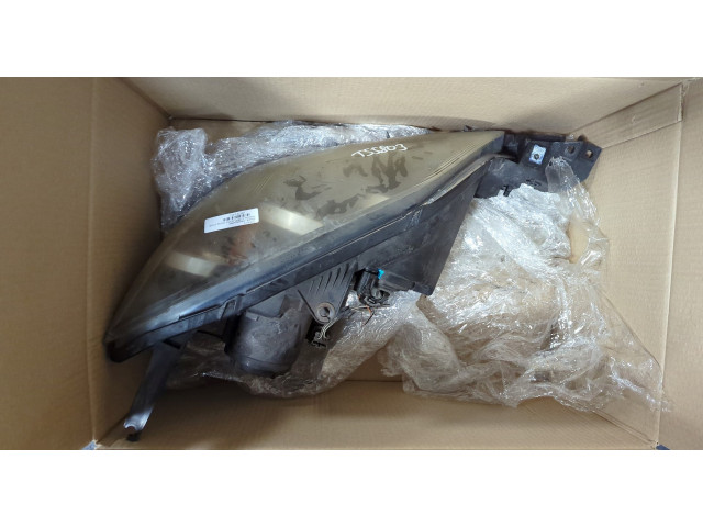 Фара передняя  Mazda 3 (BK) 2003-2009 левая 