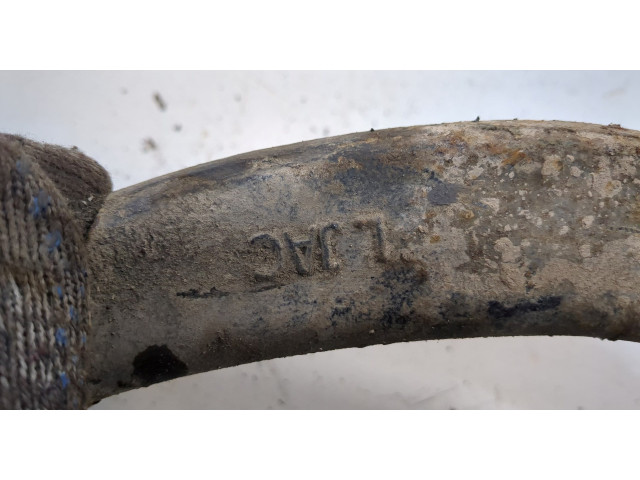 Стойка амортизатора  SsangYong Rexton 2012-2017      