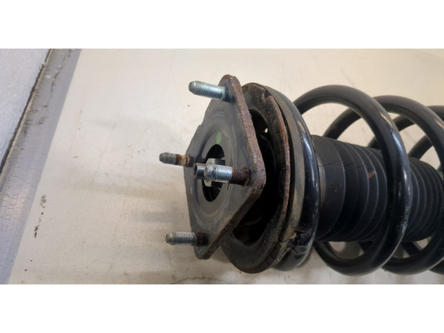 Стойка амортизатора  Mazda CX-9 2012-2016      