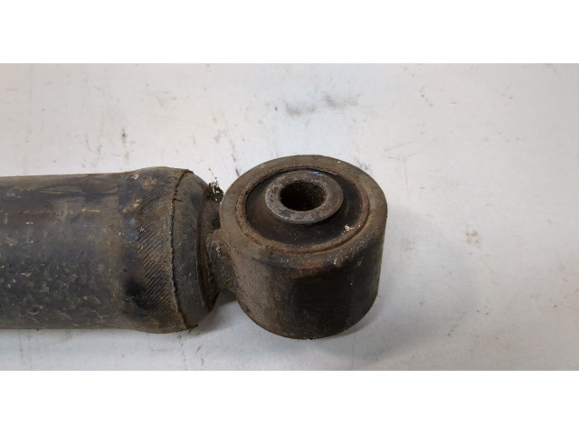 Стойка амортизатора  SsangYong Rexton 2006-2012      