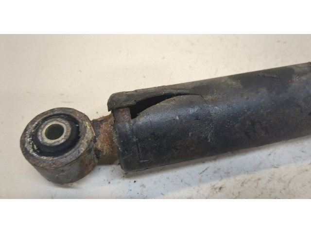 Стойка амортизатора Ford Sierra 1141610, 1141612, AM90BX18080BA, AM89BX18080AA 1.6 бензин