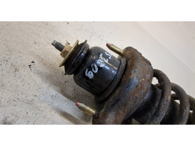 Стойка амортизатора Mitsubishi Outlander 2003-2009 MN101520, MN101522