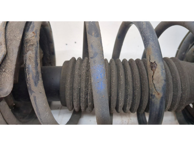 Стойка амортизатора  Mazda 323 (BJ) 1998-2003      