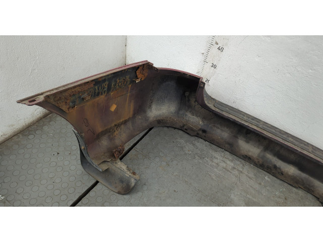 Бампер  KIA Carnival 1998-2006 задний   