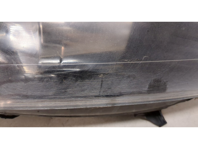 Фара передняя Renault Scenic 2009-2012 левая