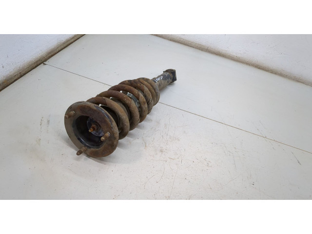 Стойка амортизатора Mitsubishi L200 2006-2015 MR992321, MR992336