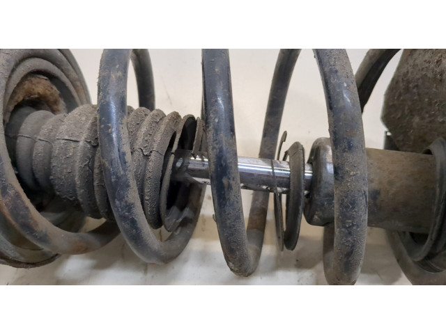 Стойка амортизатора  Nissan X-Trail (T30) 2001-2006      