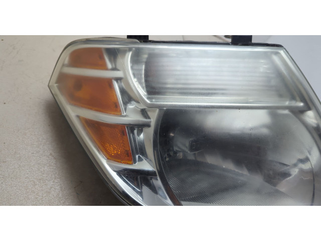 Фара передняя Nissan Pathfinder 2004-2014 правая