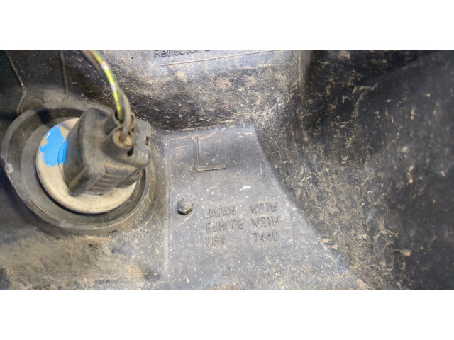 Фара передняя Mitsubishi Pajero / Montero 2000-2006 левая