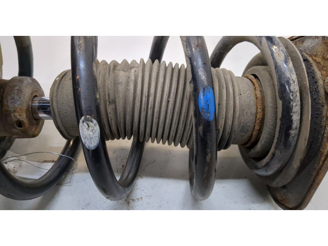 Стойка амортизатора SsangYong Korando 2010-