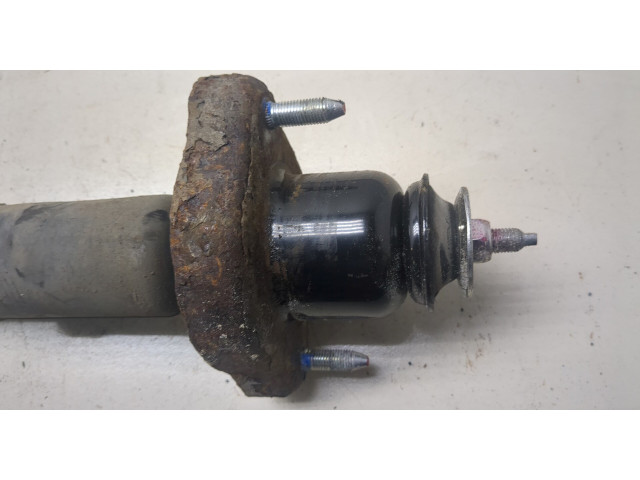 Стойка амортизатора Mitsubishi Outlander XL 2006-2012 дизель